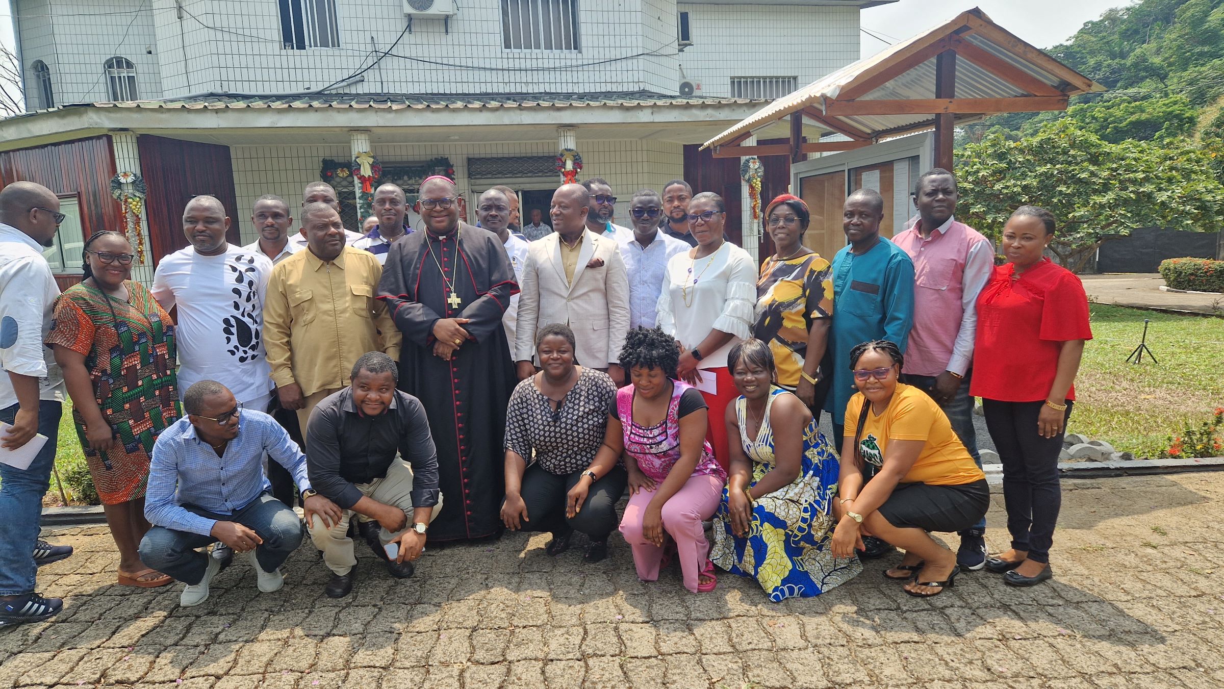 Family photograph with office workers.